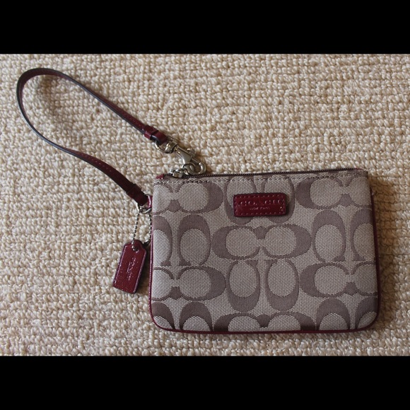 Coach Handbags - Coach Tan Logo Wristlet EUC